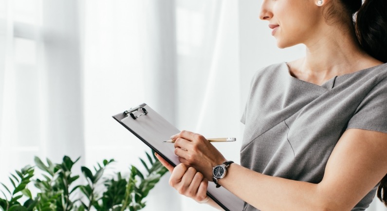 Woman taking notes